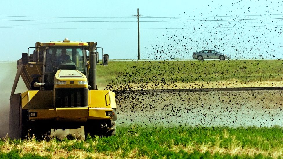 Spreading sewage sludge, or bio-solids, onto fields is common practice in many parts of the world (Credit: RJ Sangosti/The Denver Post/Getty Images)