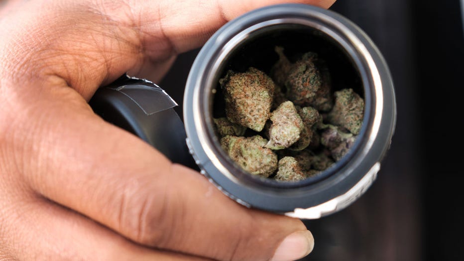 FILE - An individual purchases cannabis at a dispensary on the morning that cannabis sales became legal in New Jersey on April 21, 2022, in Paterson, New Jersey. (Photo by Spencer Platt/Getty Images)